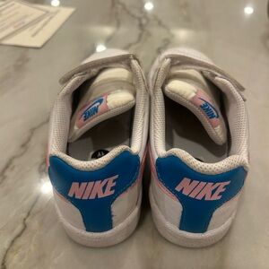 Nike Kids White and Blue Sneakers with Pink Accents